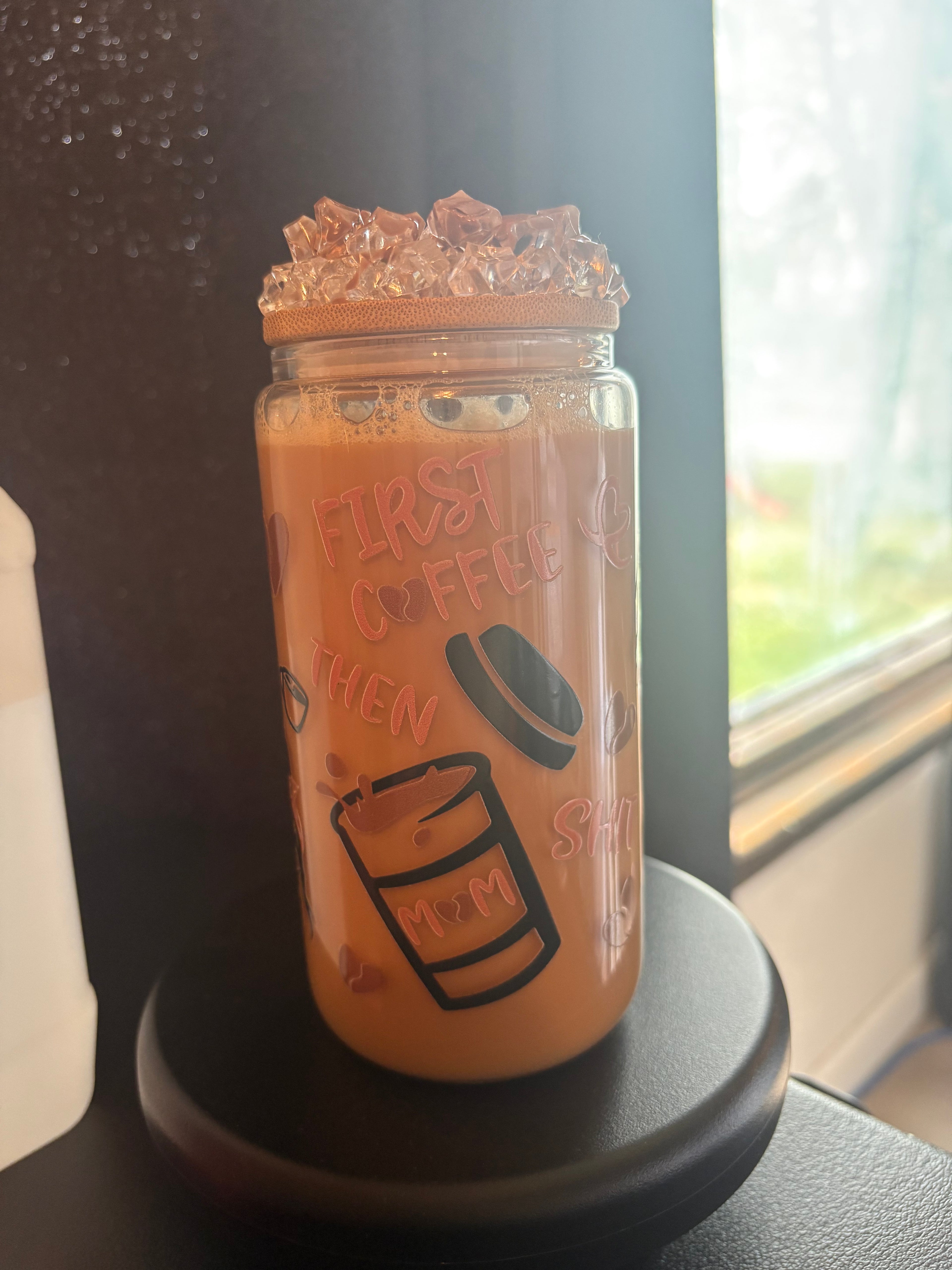 Pre made coffee cup with ice Carmel drizzle lid