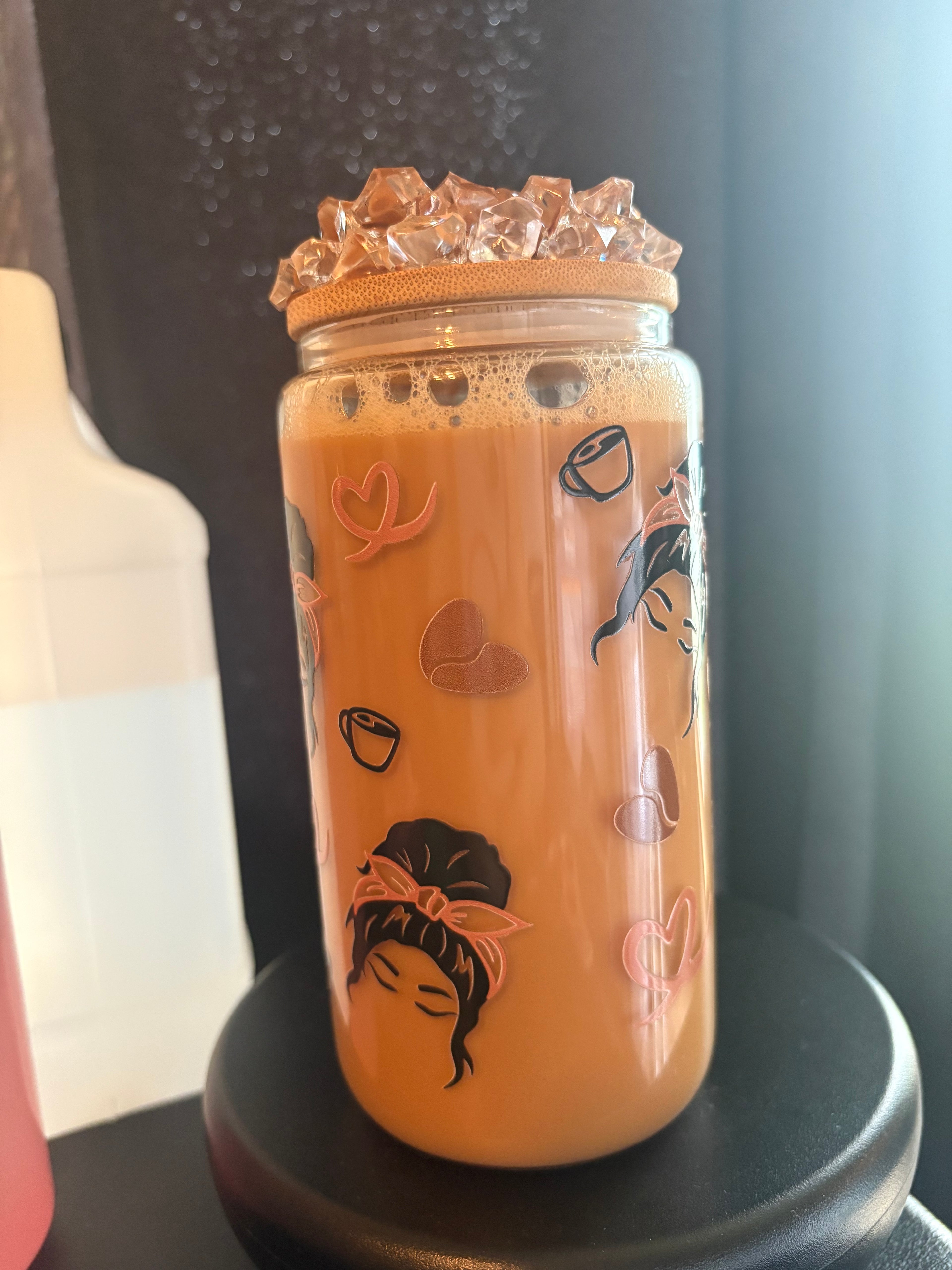 Pre made coffee cup with ice Carmel drizzle lid
