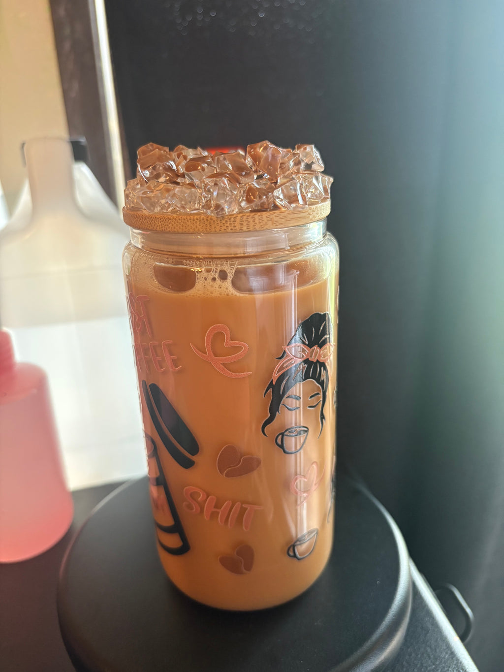 Pre made coffee cup with ice Carmel drizzle lid