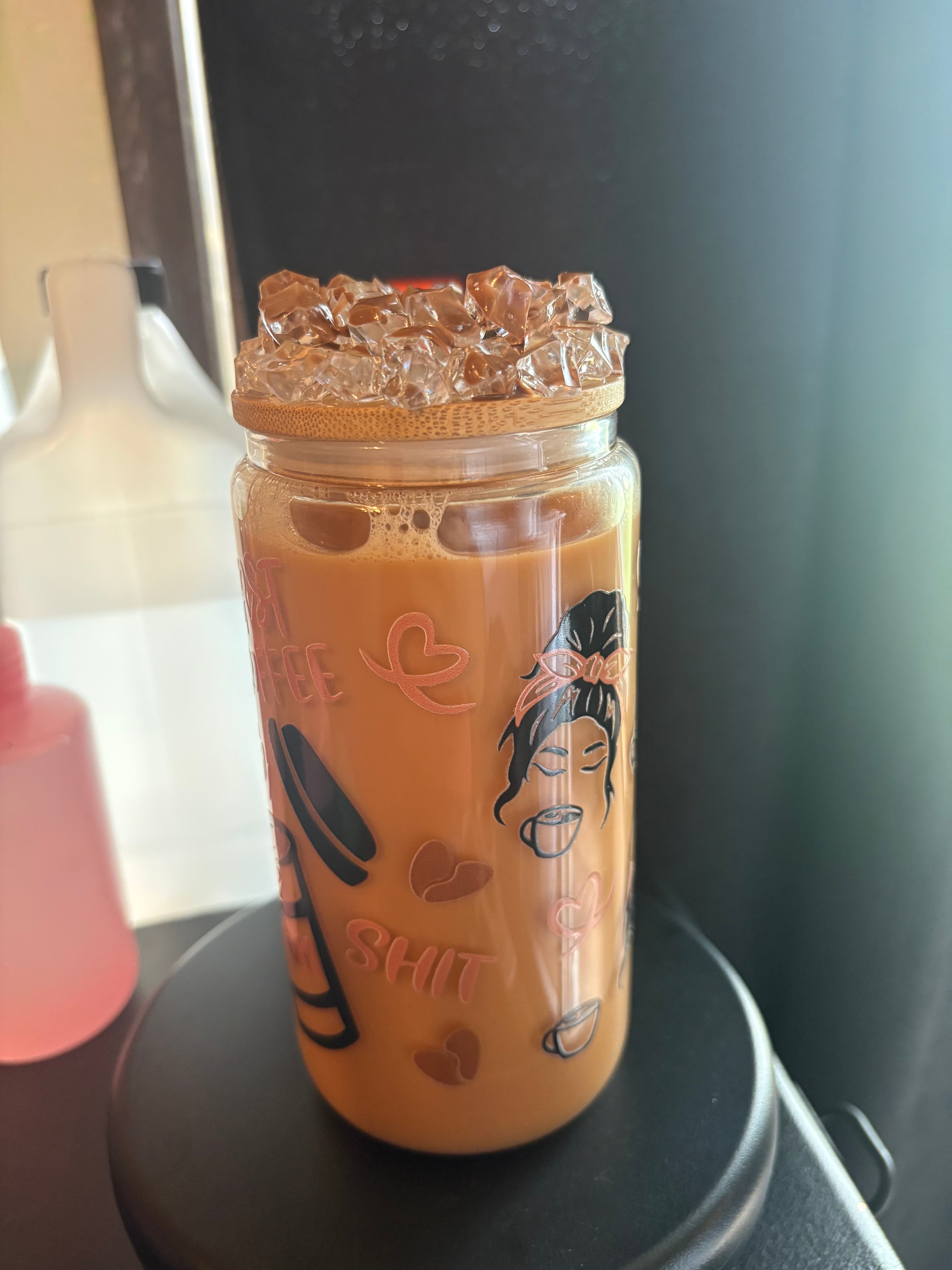 Pre made coffee cup with ice Carmel drizzle lid