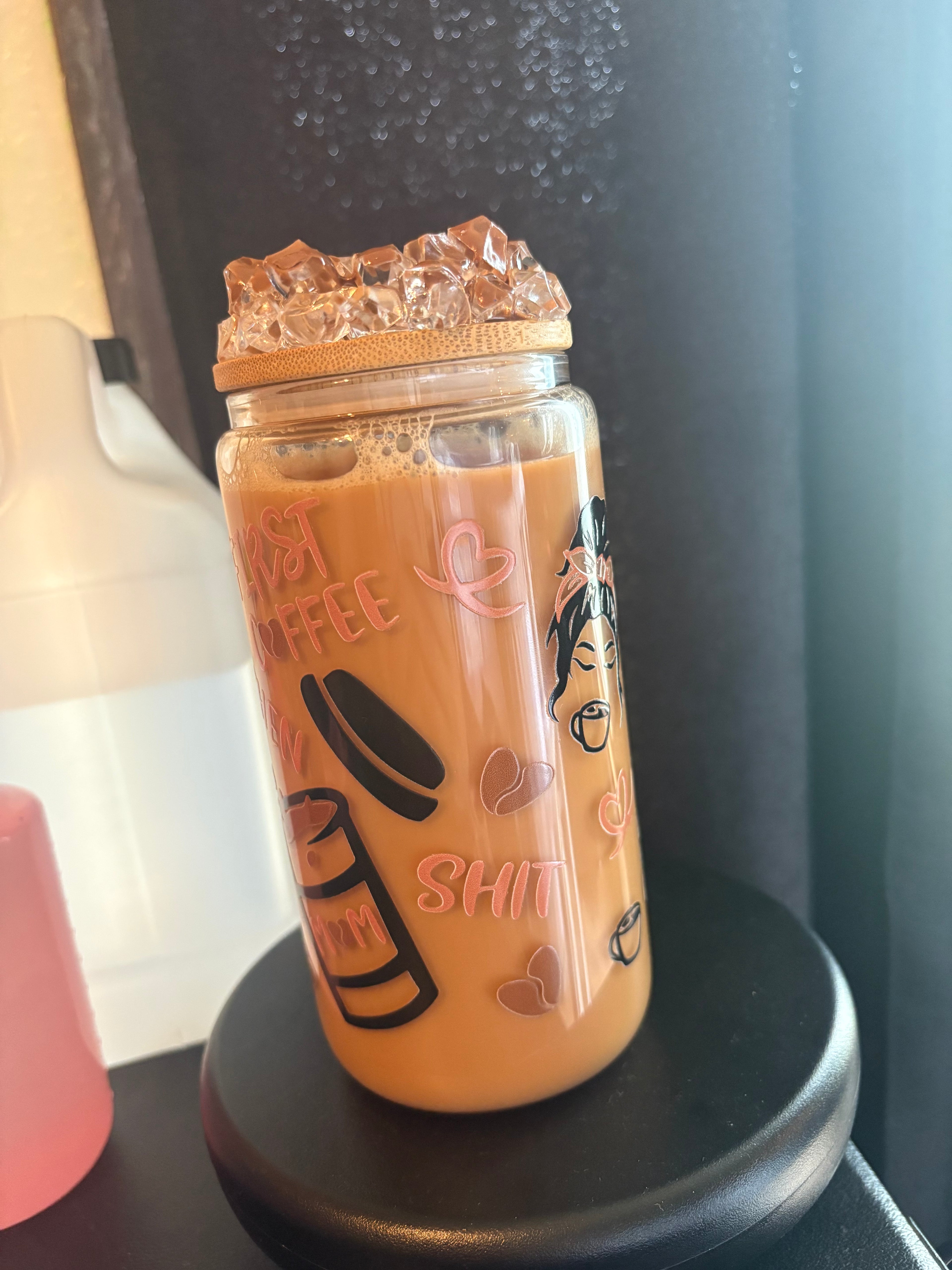 Pre made coffee cup with ice Carmel drizzle lid