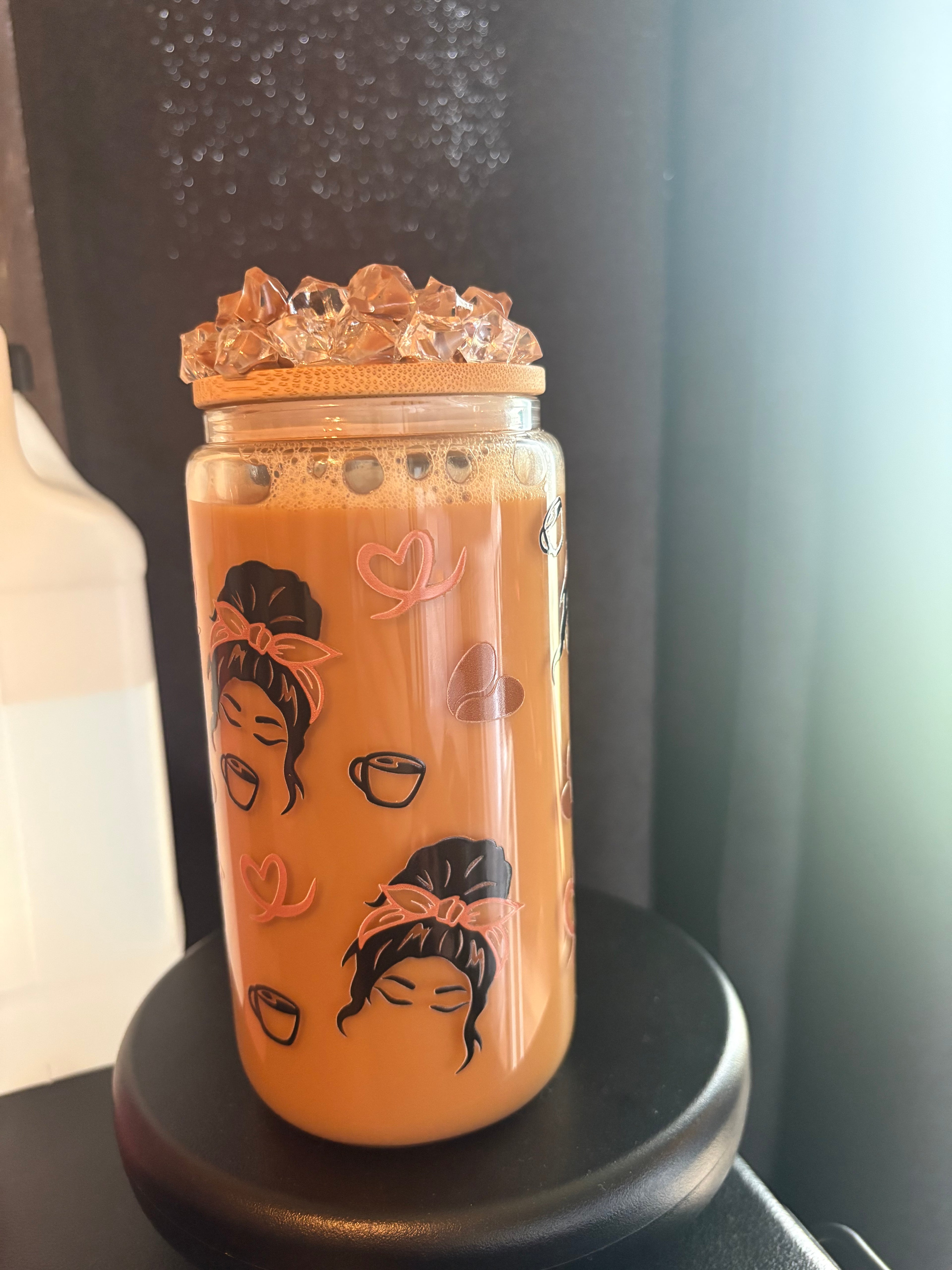 Pre made coffee cup with ice Carmel drizzle lid